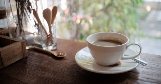 A delicious cup of coffee made in a clean coffee maker